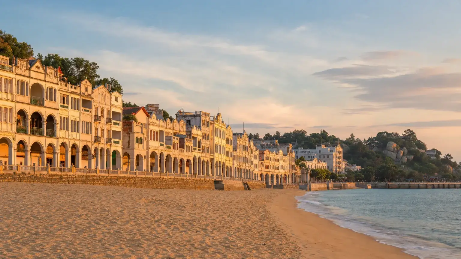 Xiamen island beach with colonial Zhongshan Road arcades behind at golden hour